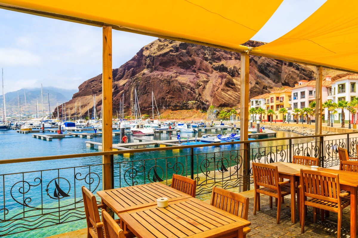 Seaside restaurant with a terrace and boat views on Madeira Island, Portugal
