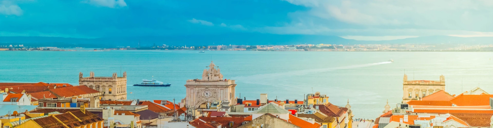 View of buildings and the Tagus River in Lisbon, Portugal View of buildings and the Tagus River in Lisbon, Portugal